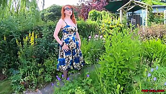 Redhead Busty Babe Masturbates In The Garden In High Heels